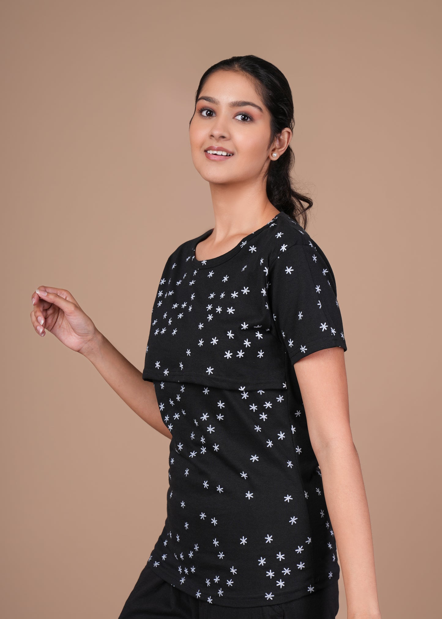 Women’s Zipless Feeding Top-Black with White Star Prints.