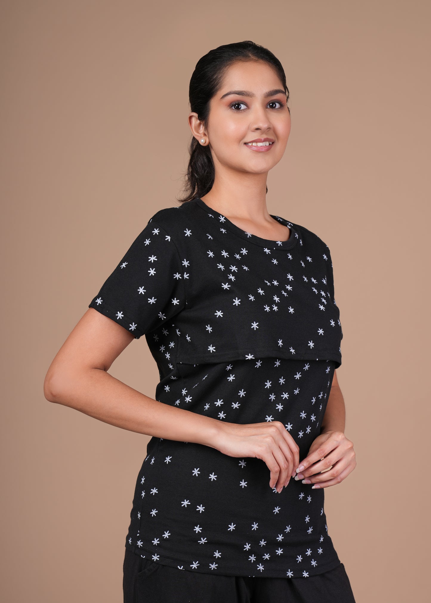 Women’s Zipless Feeding Top-Black with White Star Prints.